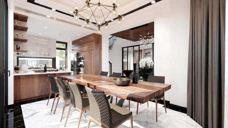 Sẽ là một gợi ý độc đáo với sự có mặt tủ bếp gỗ óc chó veneer nâu trầm kết hợp tone màu trắng sáng, long lanh từ tủ bếp trên gỗ An Cường acrylic và mặt bàn bếp đá nhân tạo gốc thạch anh. Sự tương phản giữa 2 sắc màu sẽ là ý tưởng tuyệt vời cho bố trí nội thất phòng bếp hiện đại cho không gian nhà phố, biệt thự. Thiết kế nội thất phòng bếp